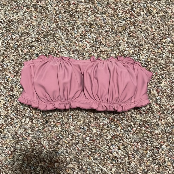 Blush colored strapless bathing suit top that comes with an attachable strap. - Picture 2 of 3